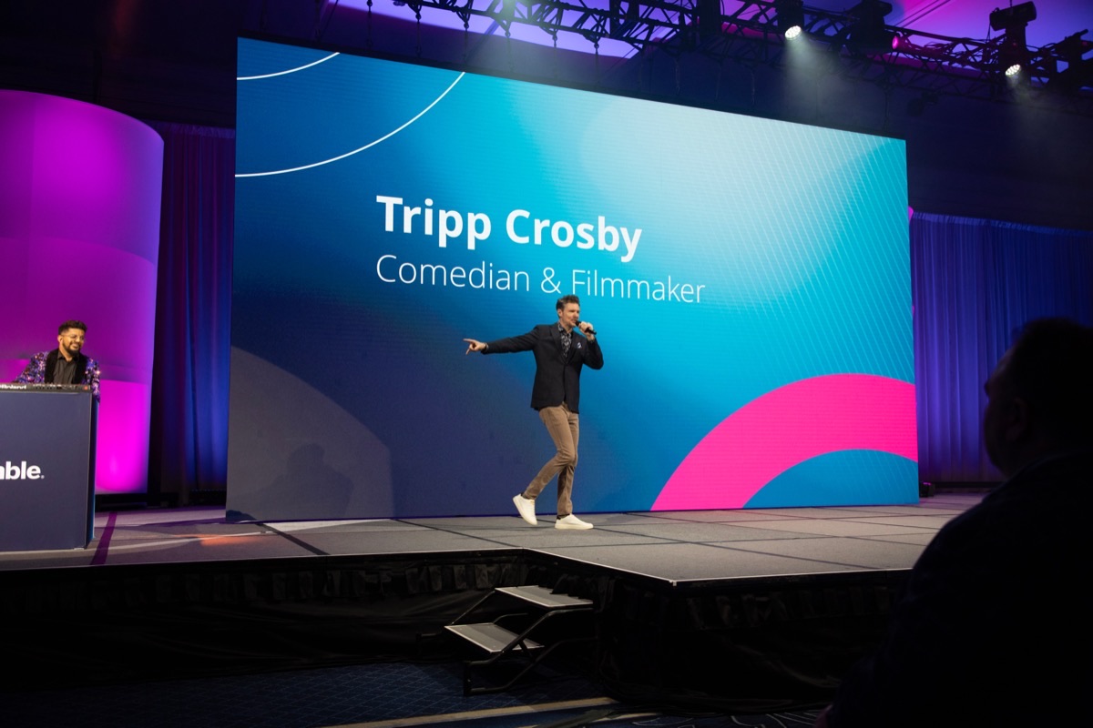 Tripp Crosby speaking on stage
